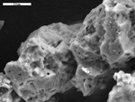 Dolomite with corrosion pits by M. Spilde and D. Northup