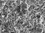 Surface texture of small irregular crystals