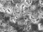 Overview of porous area: not much left after etching besides epoxy by M. Spilde and L. Melim