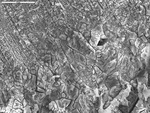 Detail on point of recrystallization cross-cutting the laminae by M. Spilde, D. Northup, and L. Melim