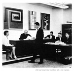 Caption: UNM Law School's Moot Court room with a trial in process. by University of New Mexico School of Law