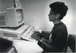Student researching on a computer. by University of New Mexico School of Law